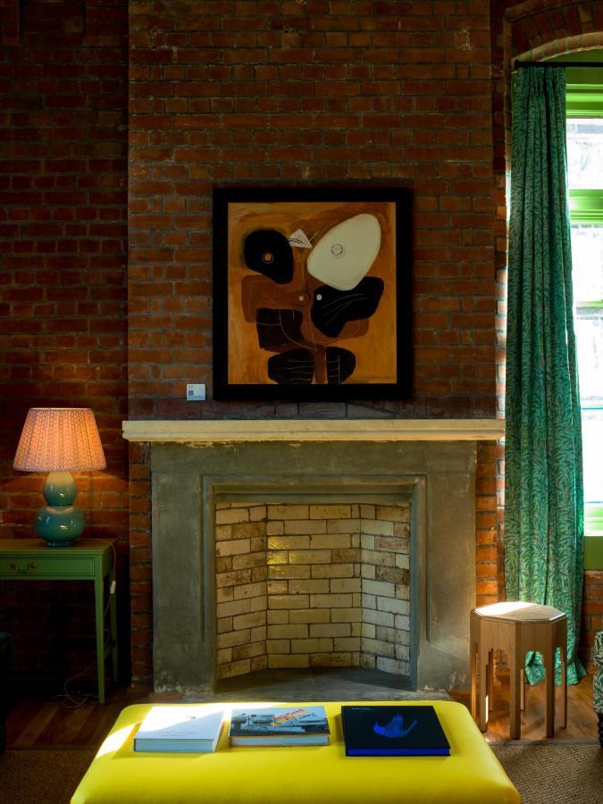 The Observatory Hotel Christchurch Buitenkant foto A fireplace at the house